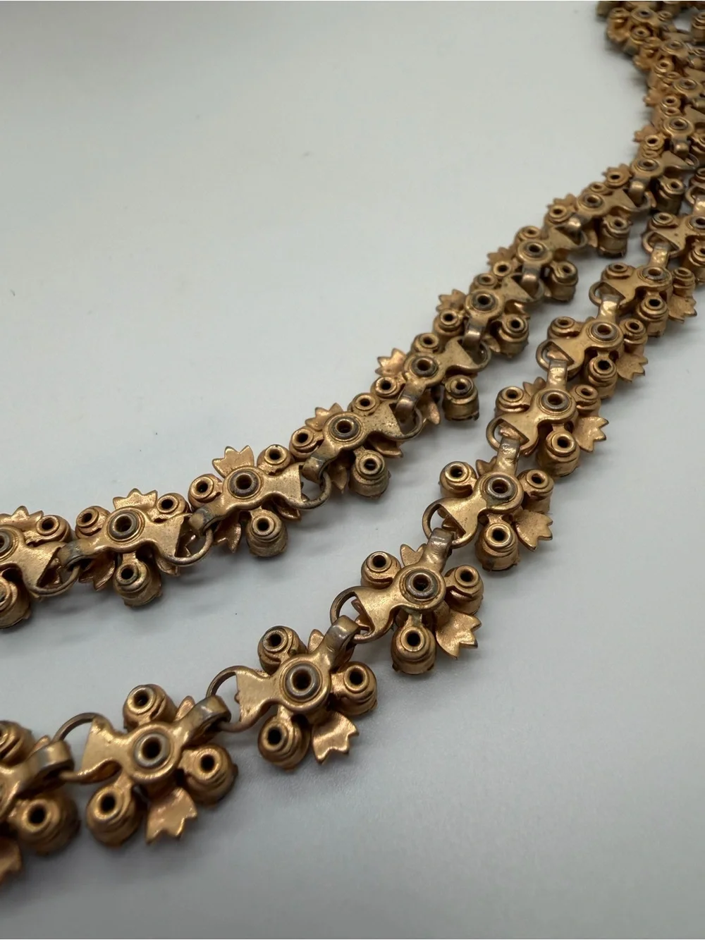 Vintage gold tone blue and clear rhinestone flower necklace